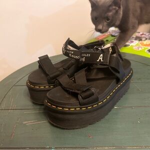 Dr. Martens Black Sandals with White Accents